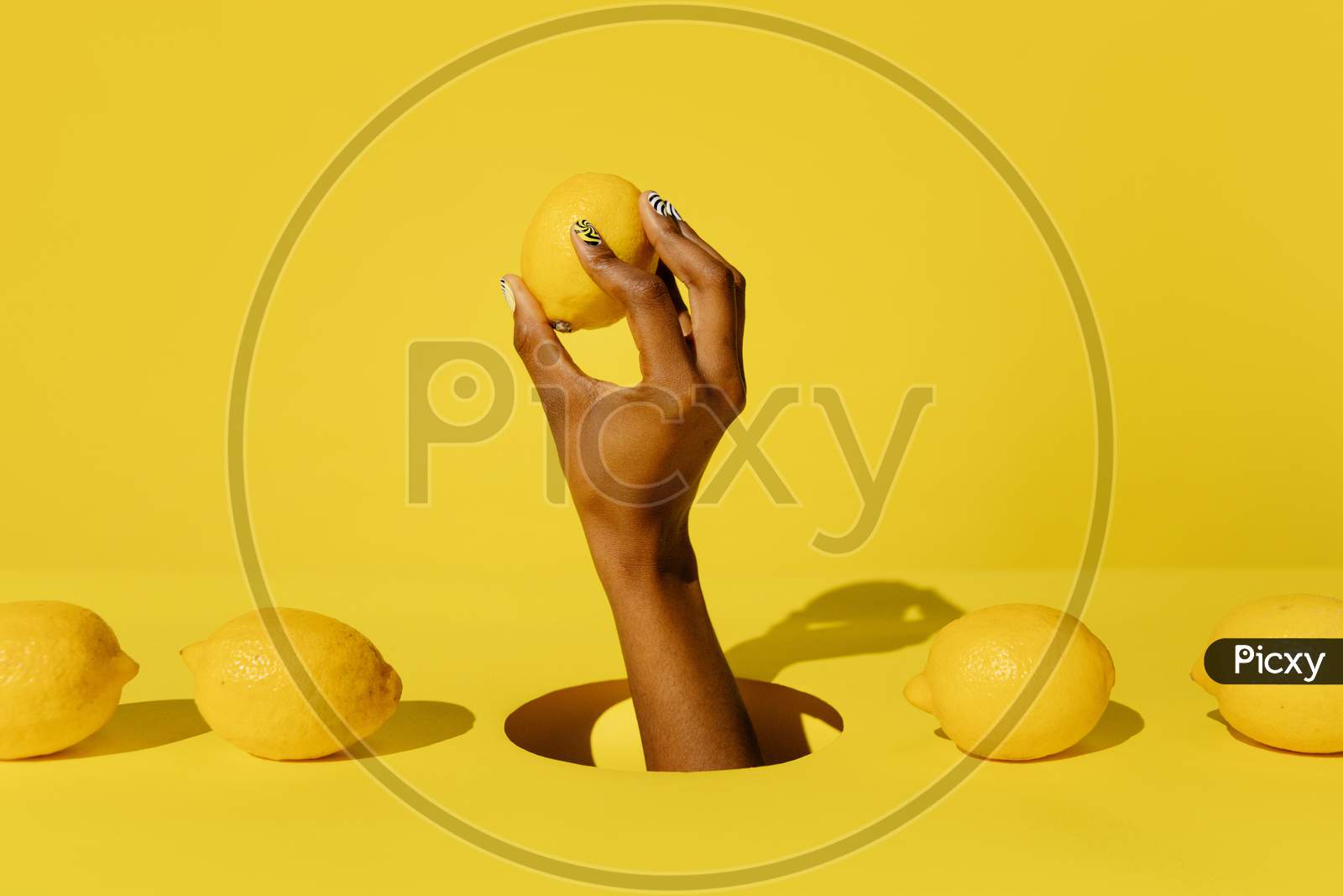 lemons held in hand