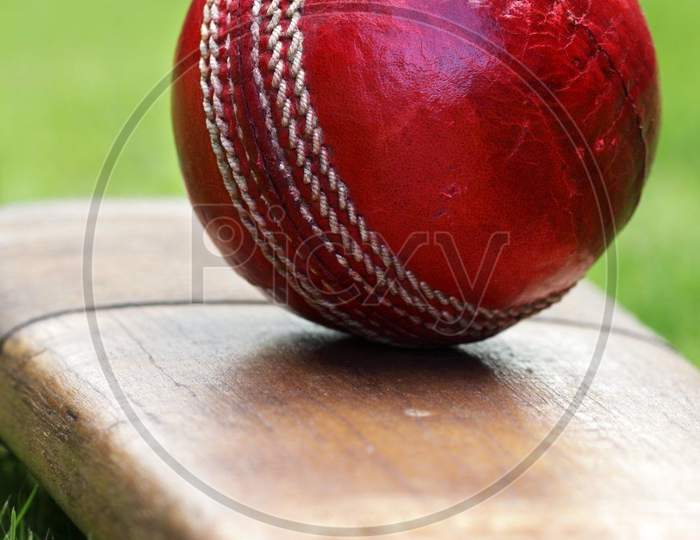 red cricket ball