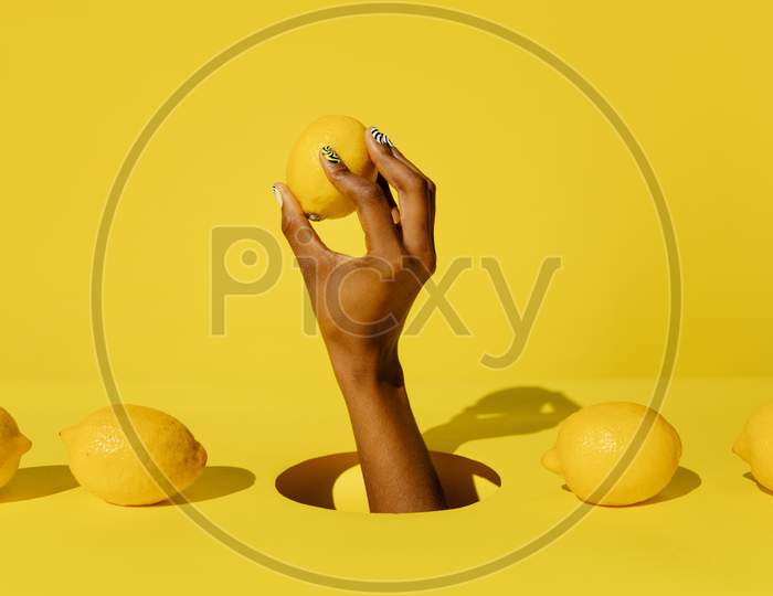 lemons held in hand