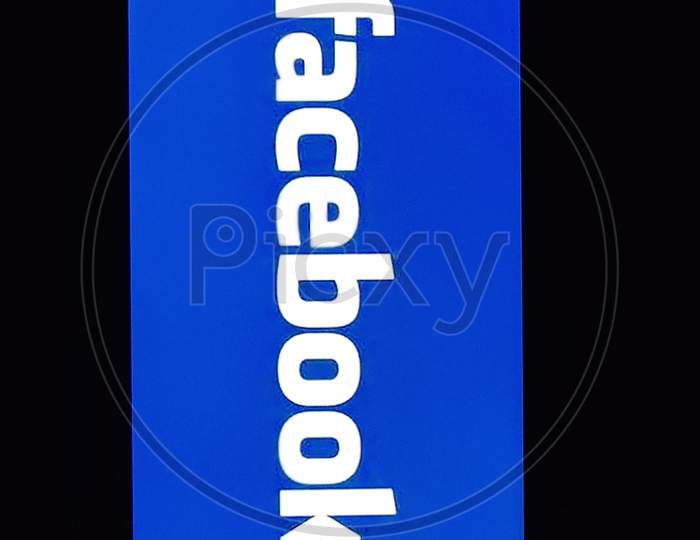 Facebook application on the screen. facebook is a photo-sharing app for smartphones
