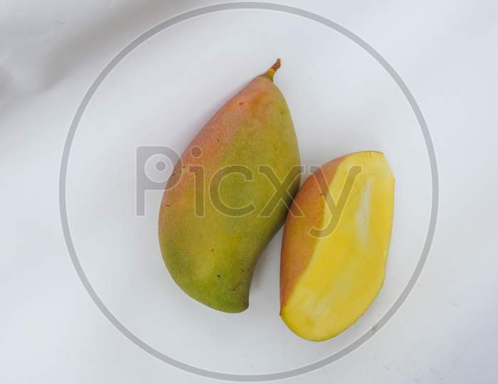 Image of Single and group of Totapuri Raw Mango Fruit isolated on
