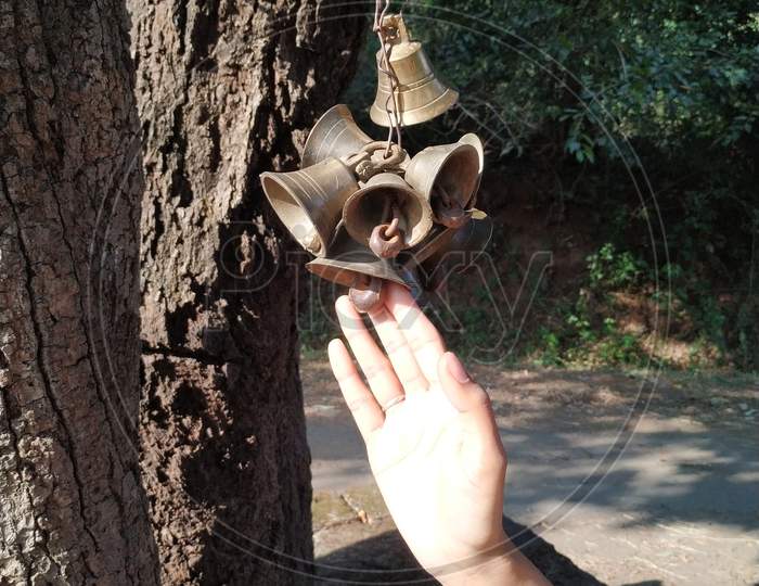 Number of bells hanging to tree outside the temple