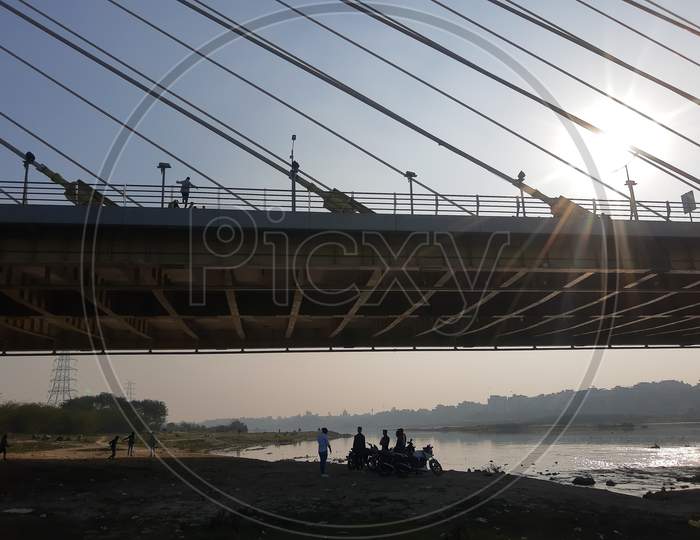 Delhi, India-July 03 2021 : Signature Bridge Is A Cantilever Spar Cable-Stayed Bridge Which Spans The Yamuna River At Wazirabad Section, Connecting Wazirabad To East Delhi.