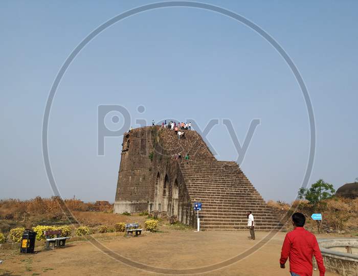 Stone structured historical tall tower on fort for security purpose