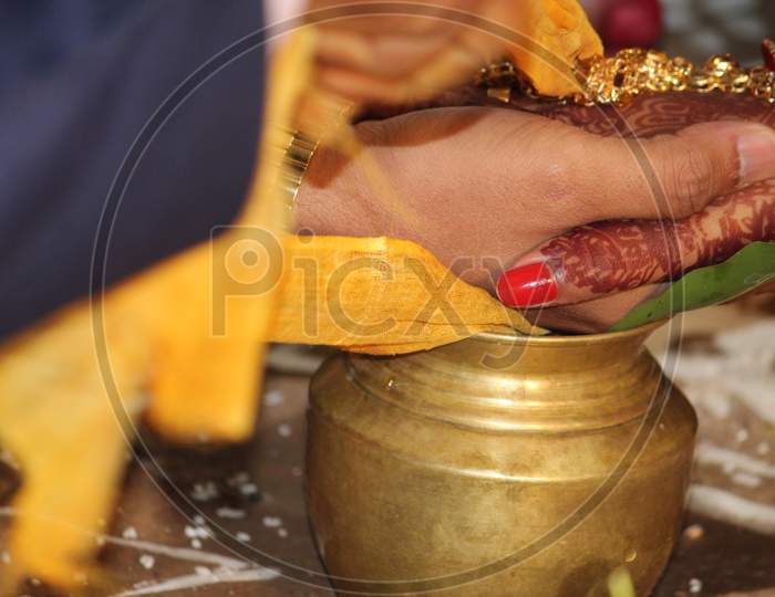 Indian Hindu traditional wedding, Couple holding hands for the first time