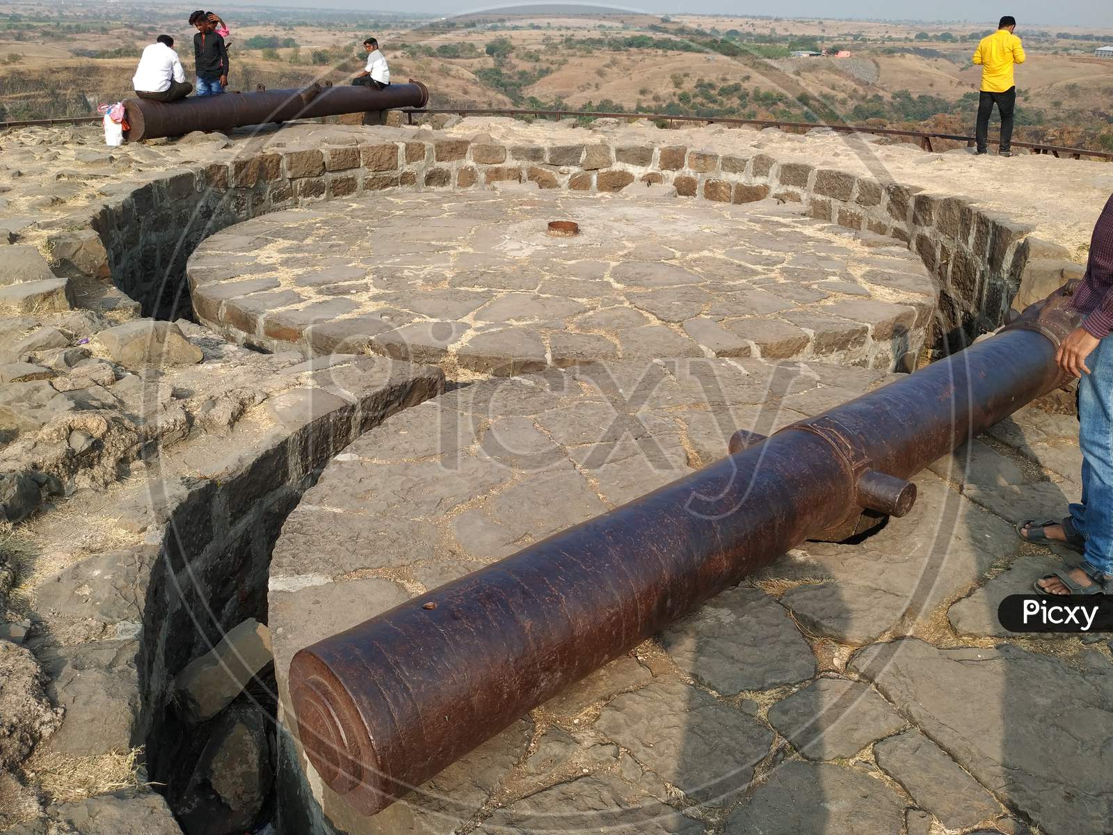 Heavy historical steel cannon on fort tower