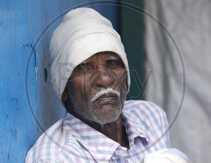 Indian Old man at rural home