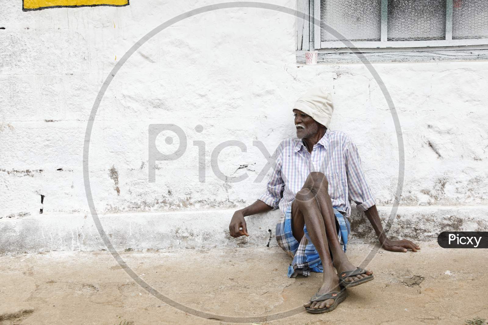 Indian Old man at rural home