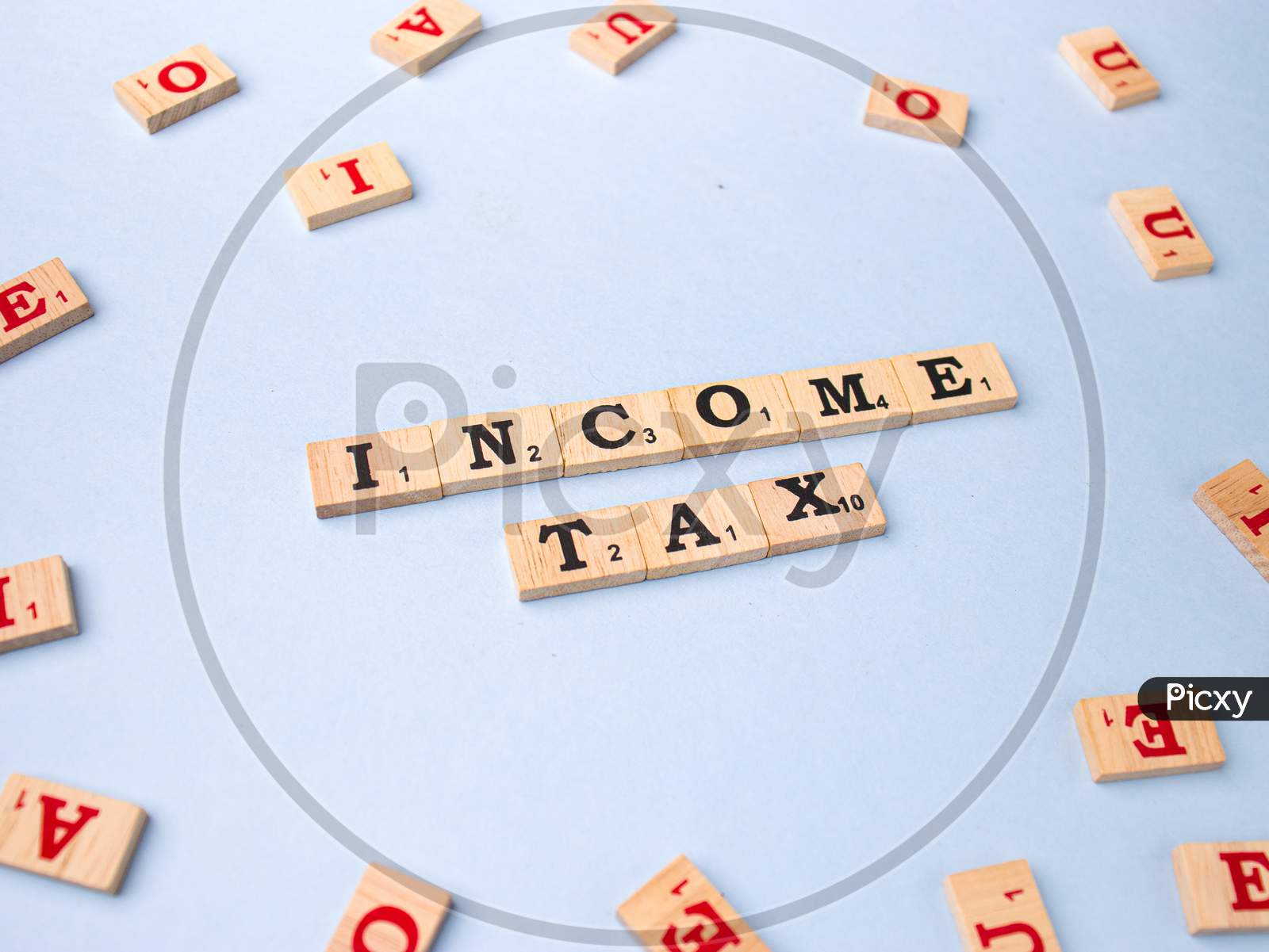 Assam, india - March 30, 2021 : Word INCOME TAX written on wooden cubes stock image.