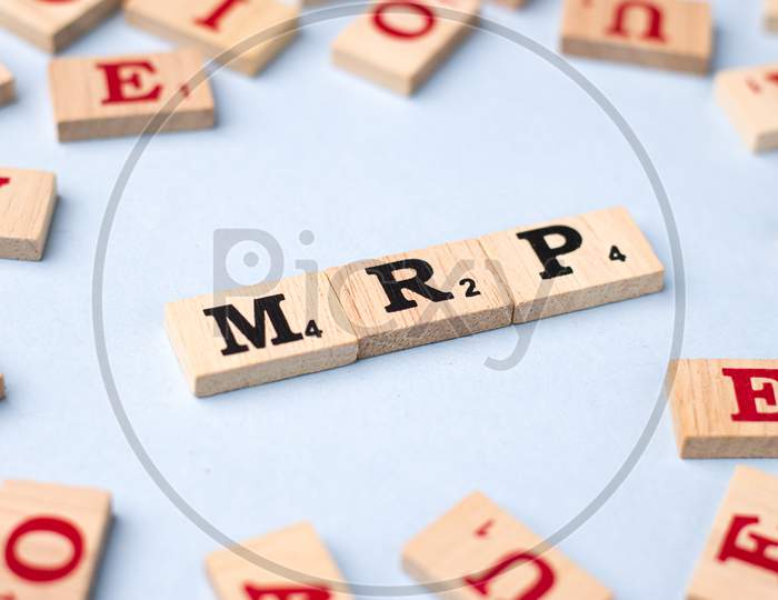 Assam, india - March 30, 2021 : Word MRP written on wooden cubes stock image.