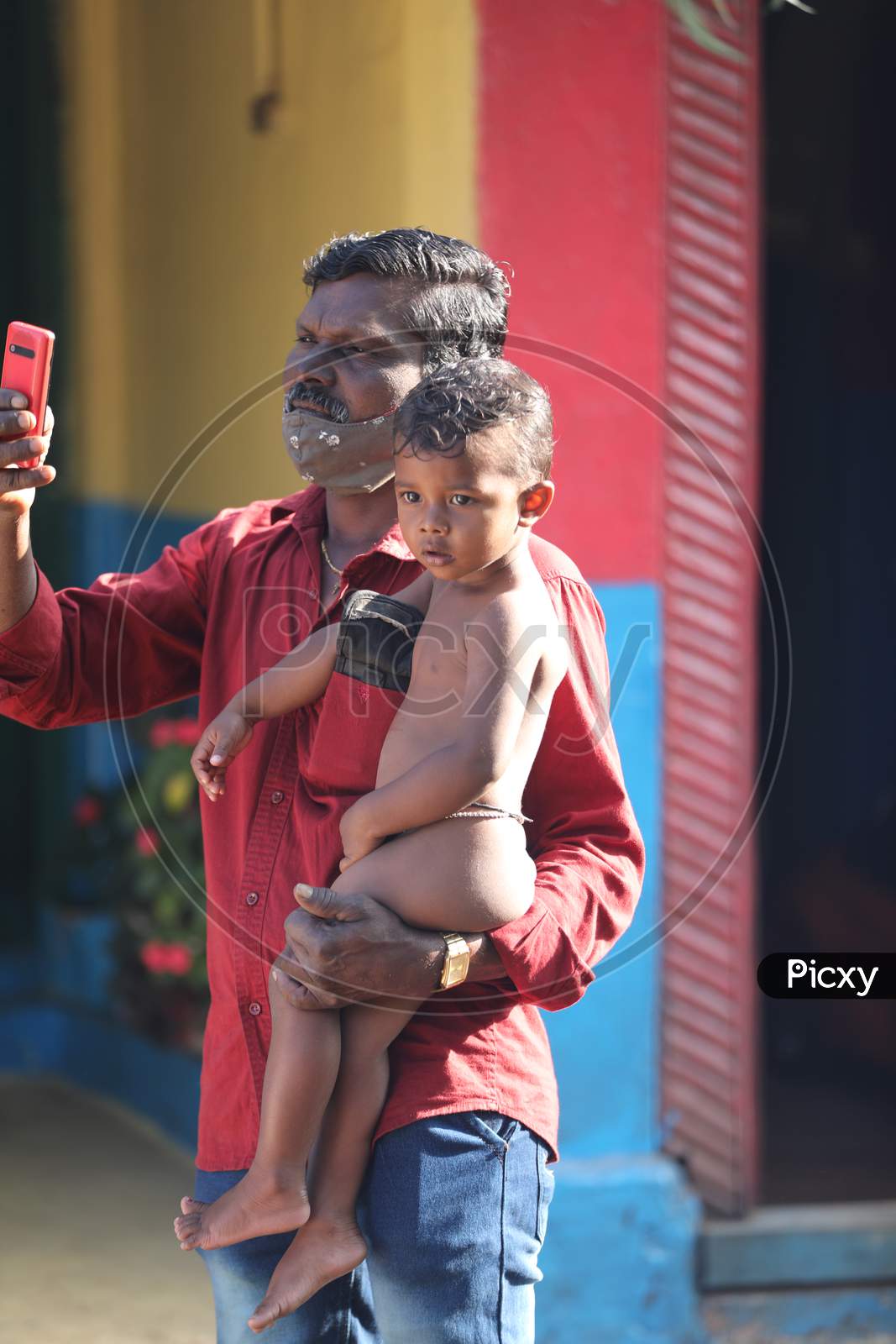 Father and child with Cell Phone