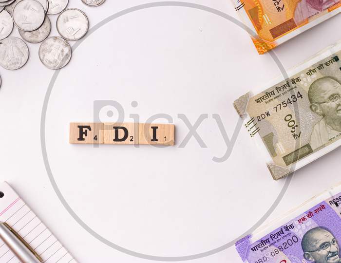 Assam, india - March 30, 2021 : Word FDI written on wooden cubes stock image.