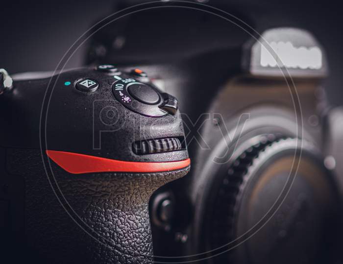 Professional Build Quality Modern Dslr And Front Buttons Close Up, Built With Rugged Magnesium Alloy And Carbon Fiber Materials, A Sturdy Camera With Flagship Technology,