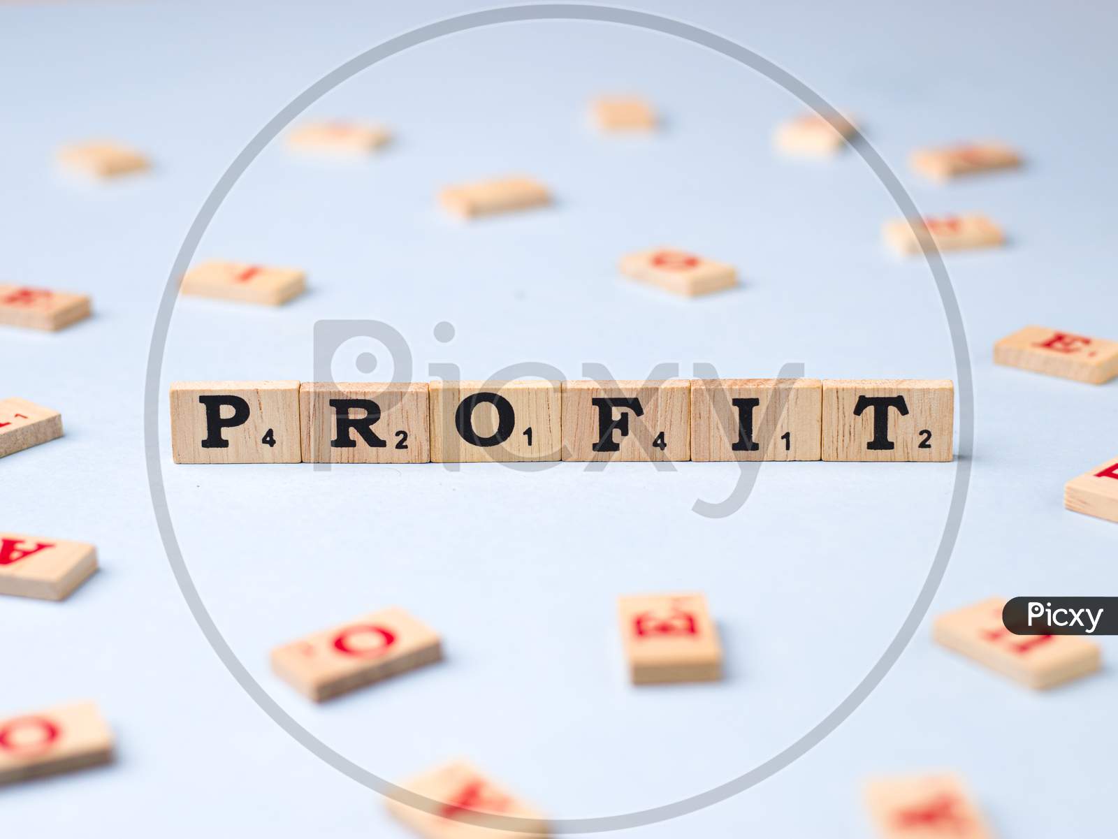 Assam, india - March 30, 2021 : Word PROFIT written on wooden cubes stock image.