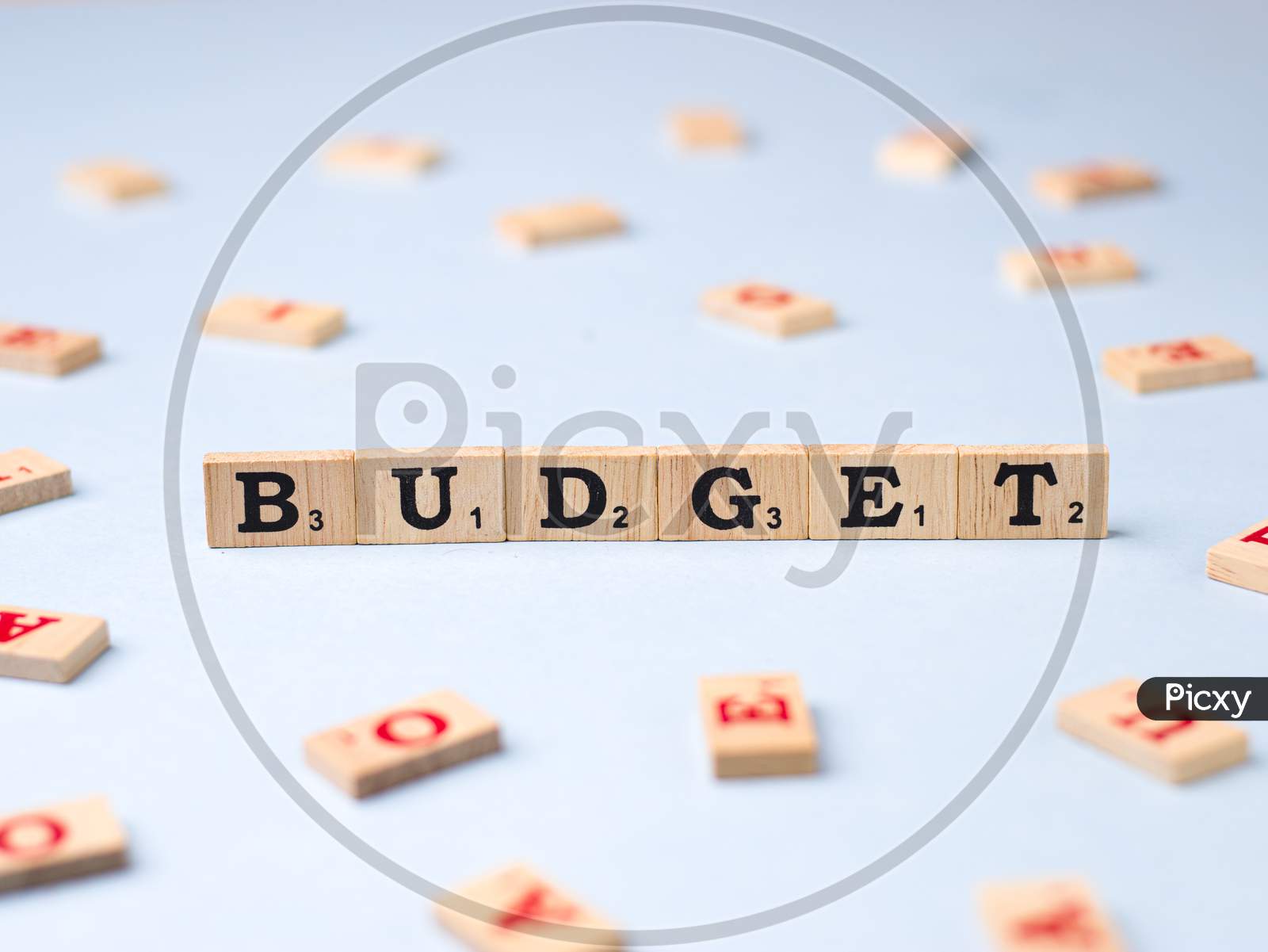 Assam, india - March 30, 2021 : Word BUDGET written on wooden cubes stock image.