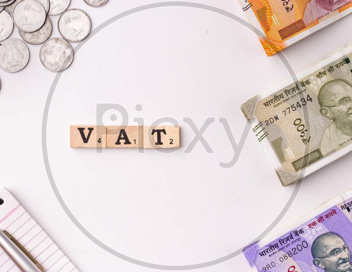 Assam, india - March 30, 2021 : Word VAT written on wooden cubes stock image.