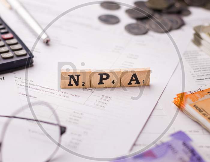 Assam, india - March 30, 2021 : Word NPA written on wooden cubes stock image.