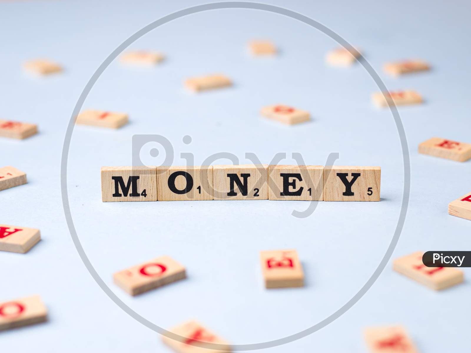 Assam, india - March 30, 2021 : Word MONEY written on wooden cubes stock image.