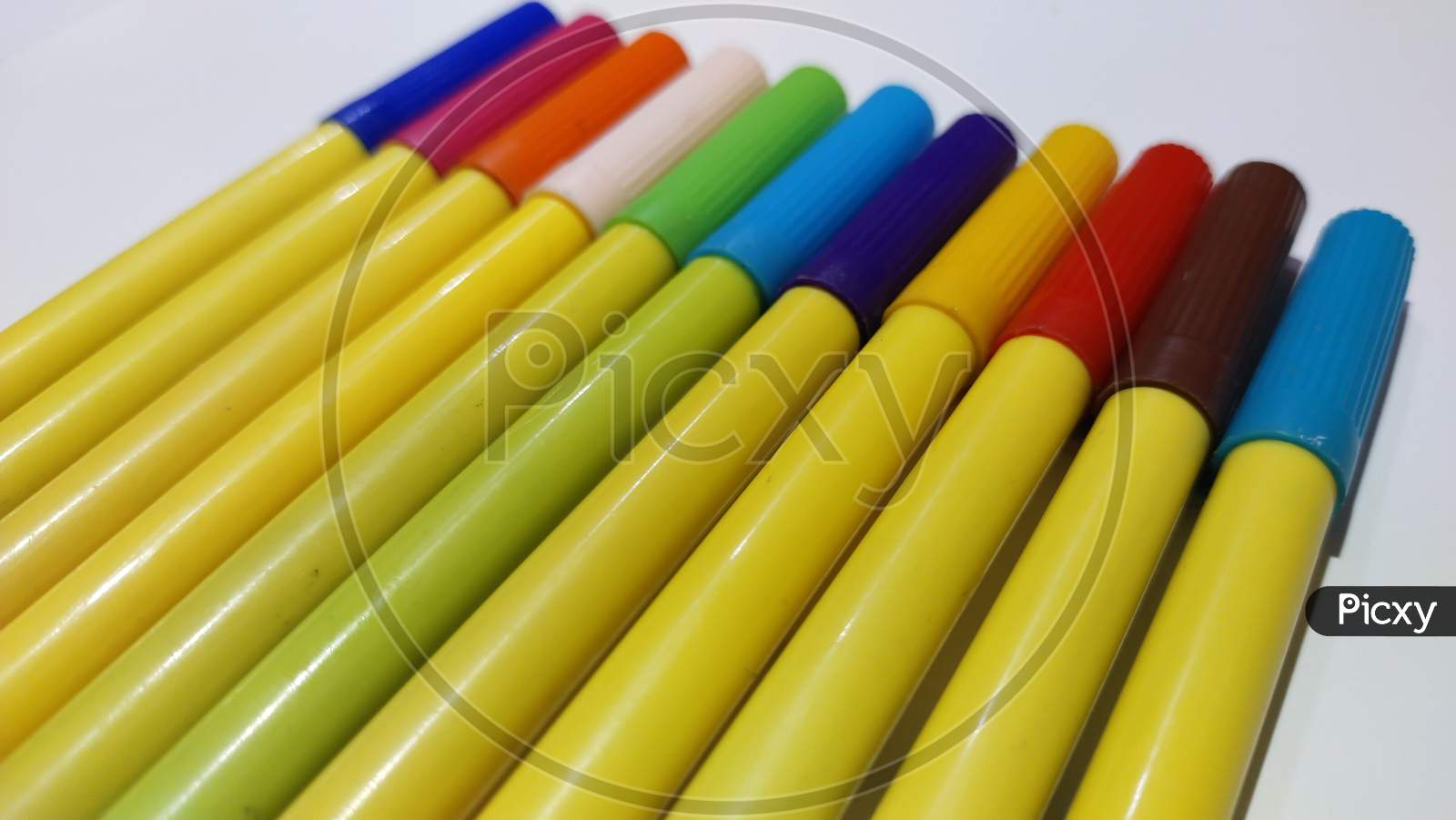 Colorfull sketch pens or markers on isolated white background