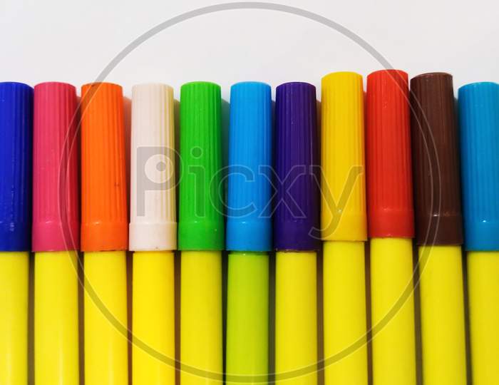 Colorfull sketch pens or markers on isolated white background