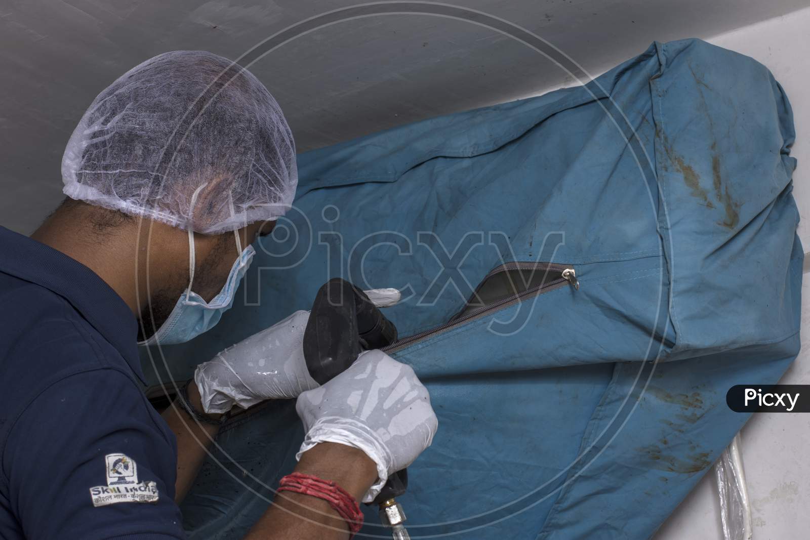 29Th May, 2021, Kolkata, West Bengal India: A Male Service Person From Urban Company Cleaning Air Condition Machine With Jet Spry.