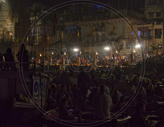 Varanasi, India - November 01,2016: Wide Angle Shot Of Ganga Aarti Ceremony Rituals Performed By Hindu Priests At Dashashwamedh Ghat In Varanasi Uttar Pradesh And Tourist And People Crowd