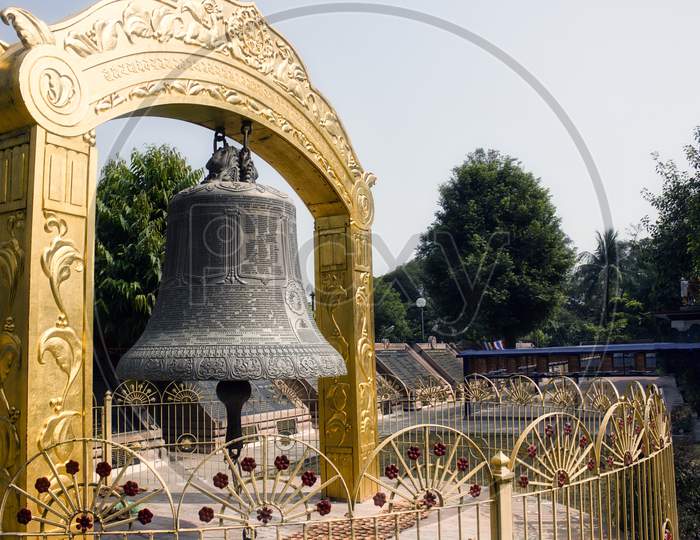The Sacred Giant Prayer Bell At Bodhi Tree Complex At Sarnath, Where Buddha Gained Enlightenment About 2500 Years Ago