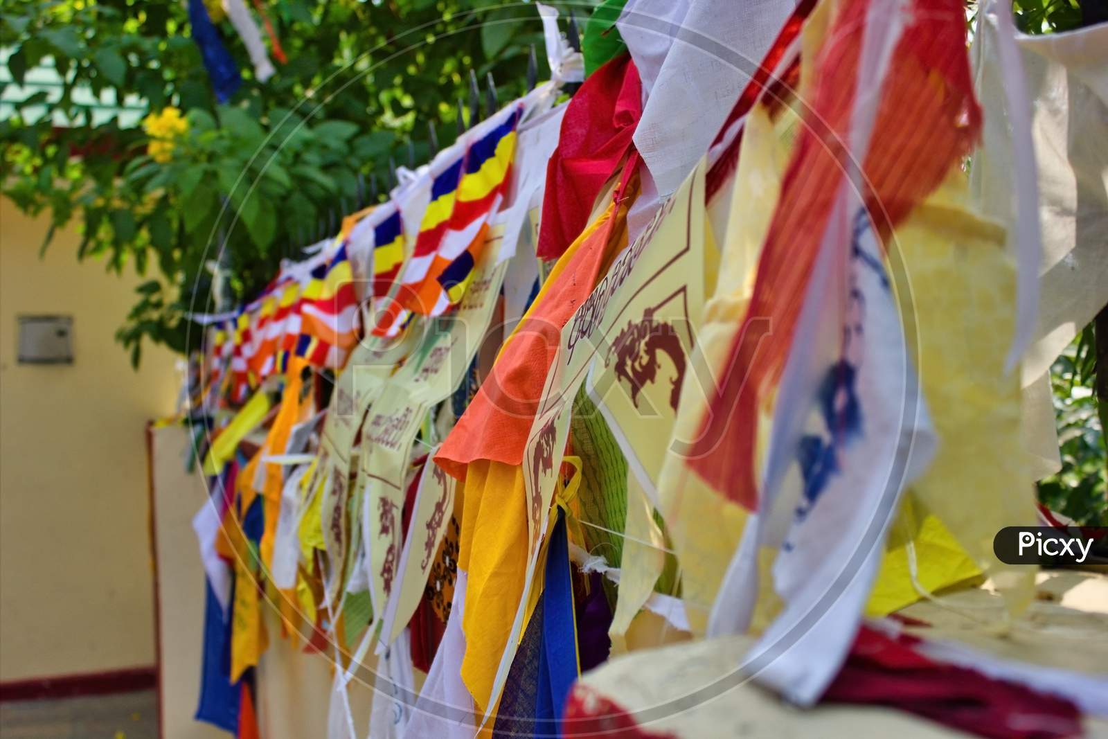 Colorful Tibetan Flags Tied At Dhamma Cakka, Sarnath In Varanasi In The State Of Uttar Pradesh, India