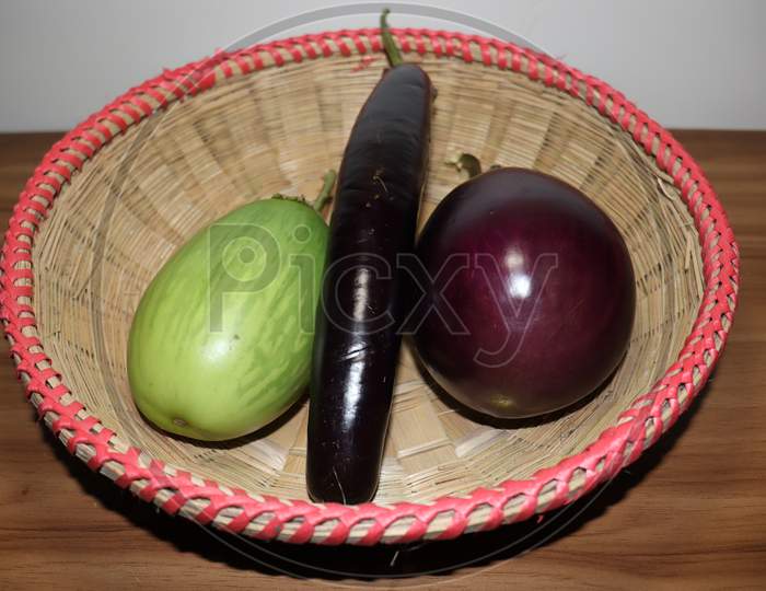 Tasty And Healthy Violet And Green Colored Brinjal