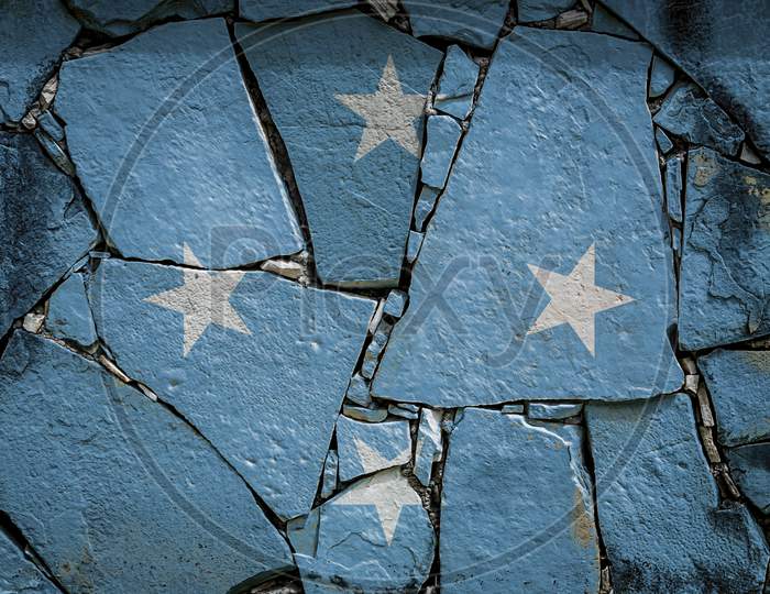 National Flag Of Federal States Of Micronesia
 Depicting In Paint Colors On An Old Stone Wall. Flag  Banner On Broken  Wall Background.