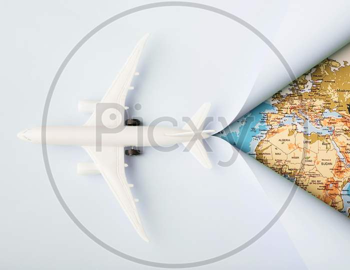 top view white toy plane map