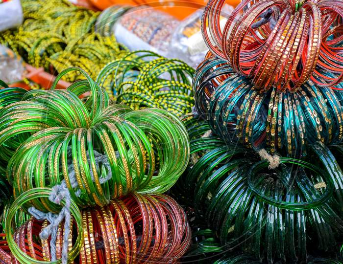 Stock Photo Of Bunch Of Colorful Bangles Made Of Glass Kept On Roadside For Sale In Sunny Afternoon At Indian Market ,Focus On Glass Bangles.