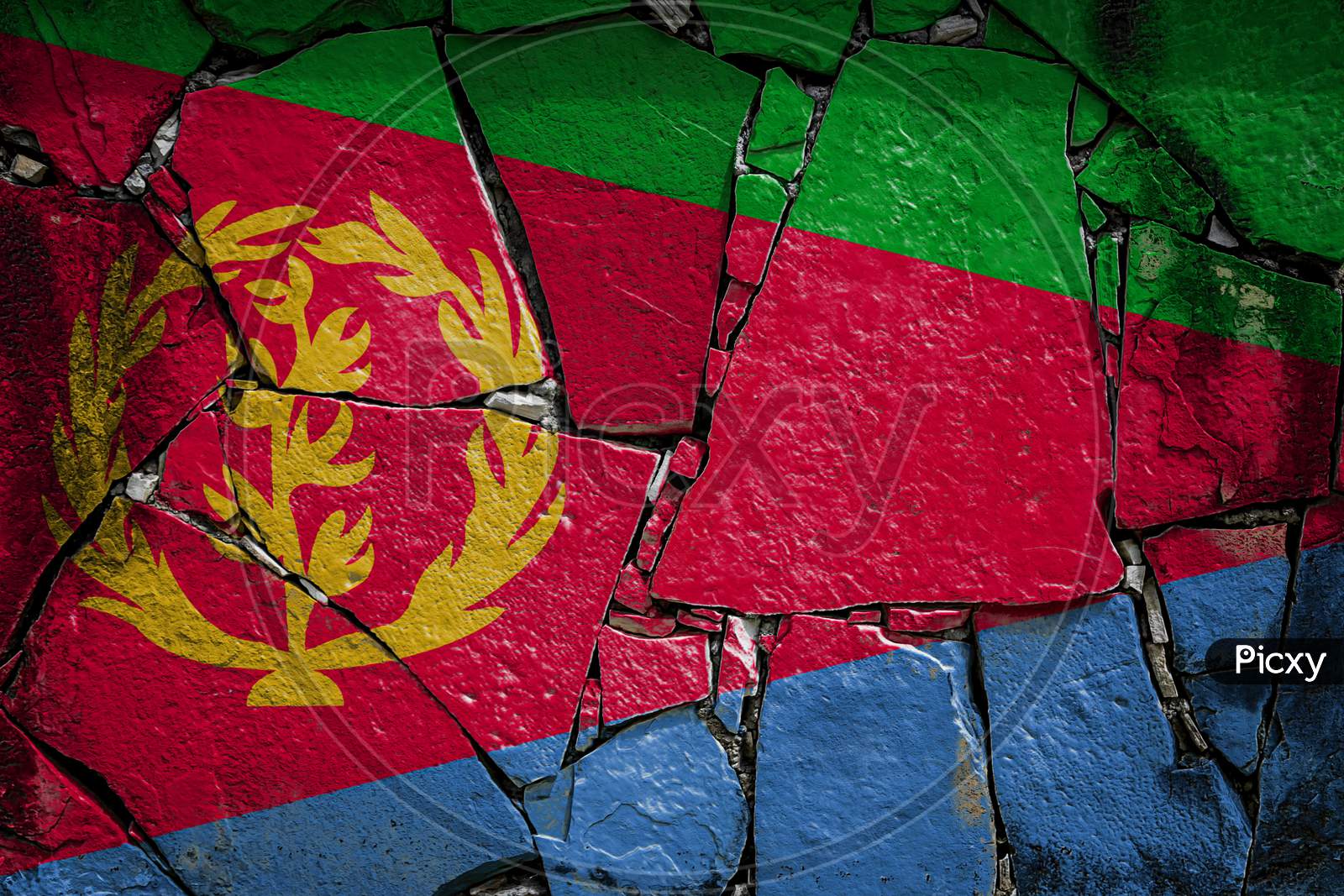 National Flag Of Eritrea
 Depicting In Paint Colors On An Old Stone Wall. Flag  Banner On Broken  Wall Background.