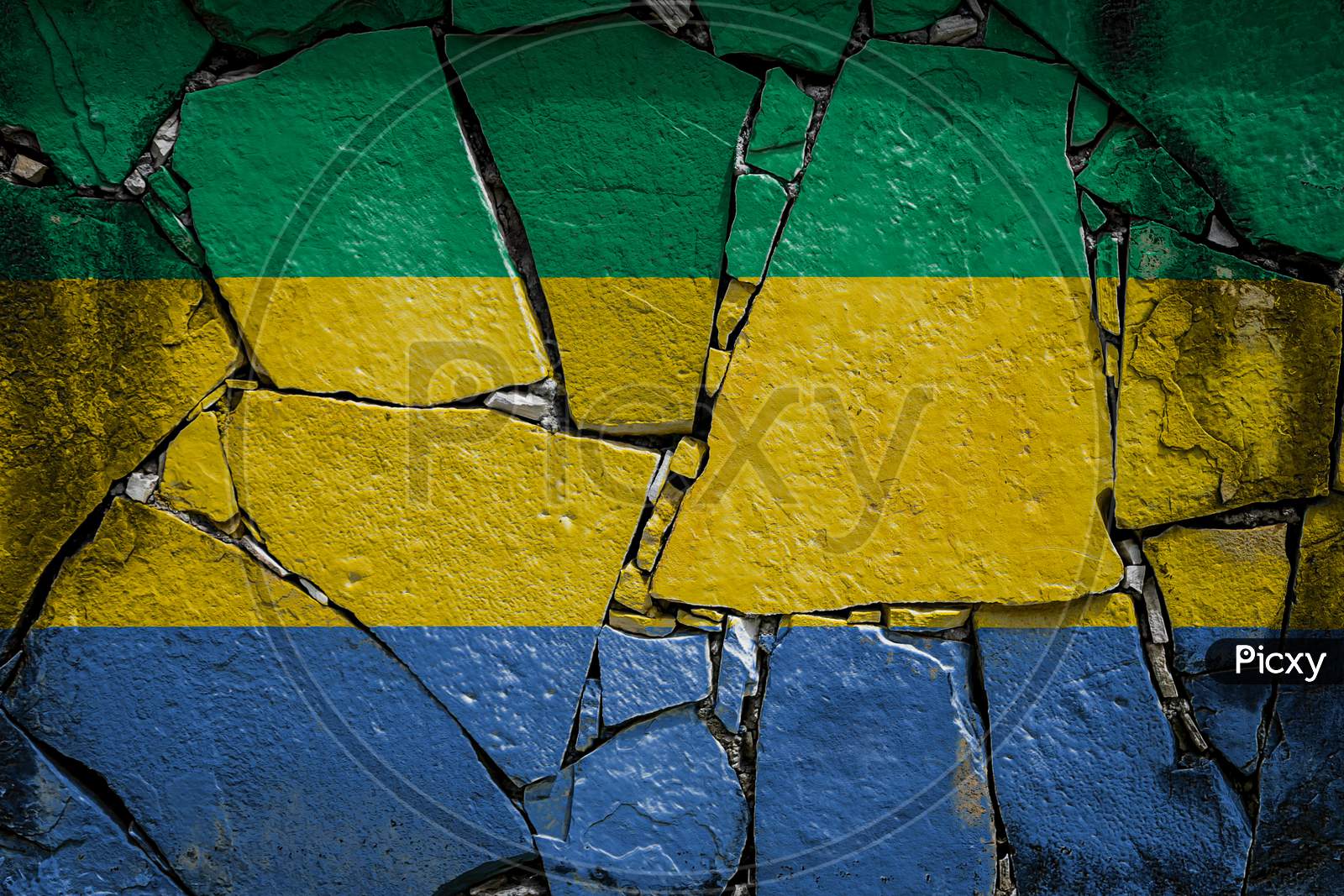 National Flag Of Gabon
 Depicting In Paint Colors On An Old Stone Wall. Flag  Banner On Broken  Wall Background.