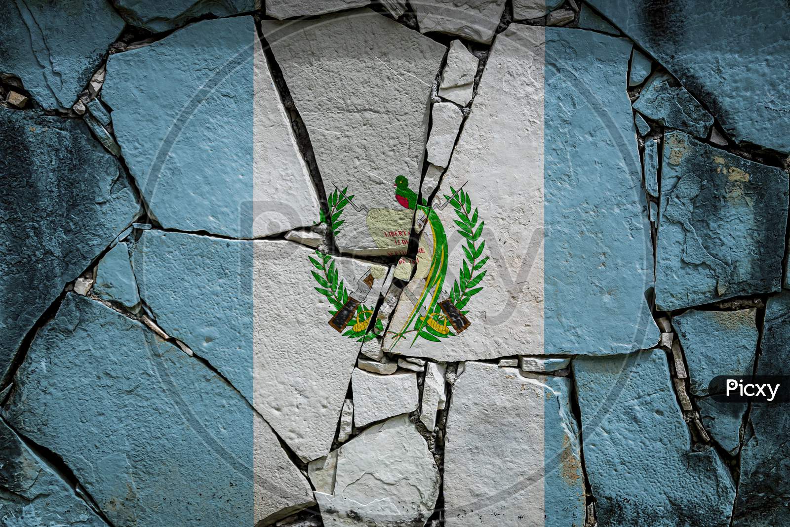 National Flag Of Guatemala
 Depicting In Paint Colors On An Old Stone Wall. Flag  Banner On Broken  Wall Background.