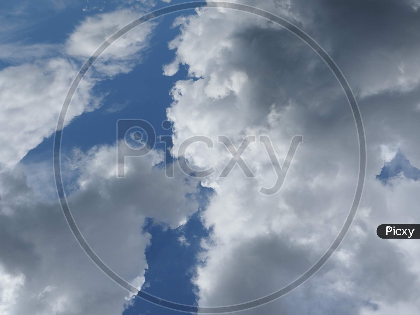Dramatic Blue Sky With Clouds Background