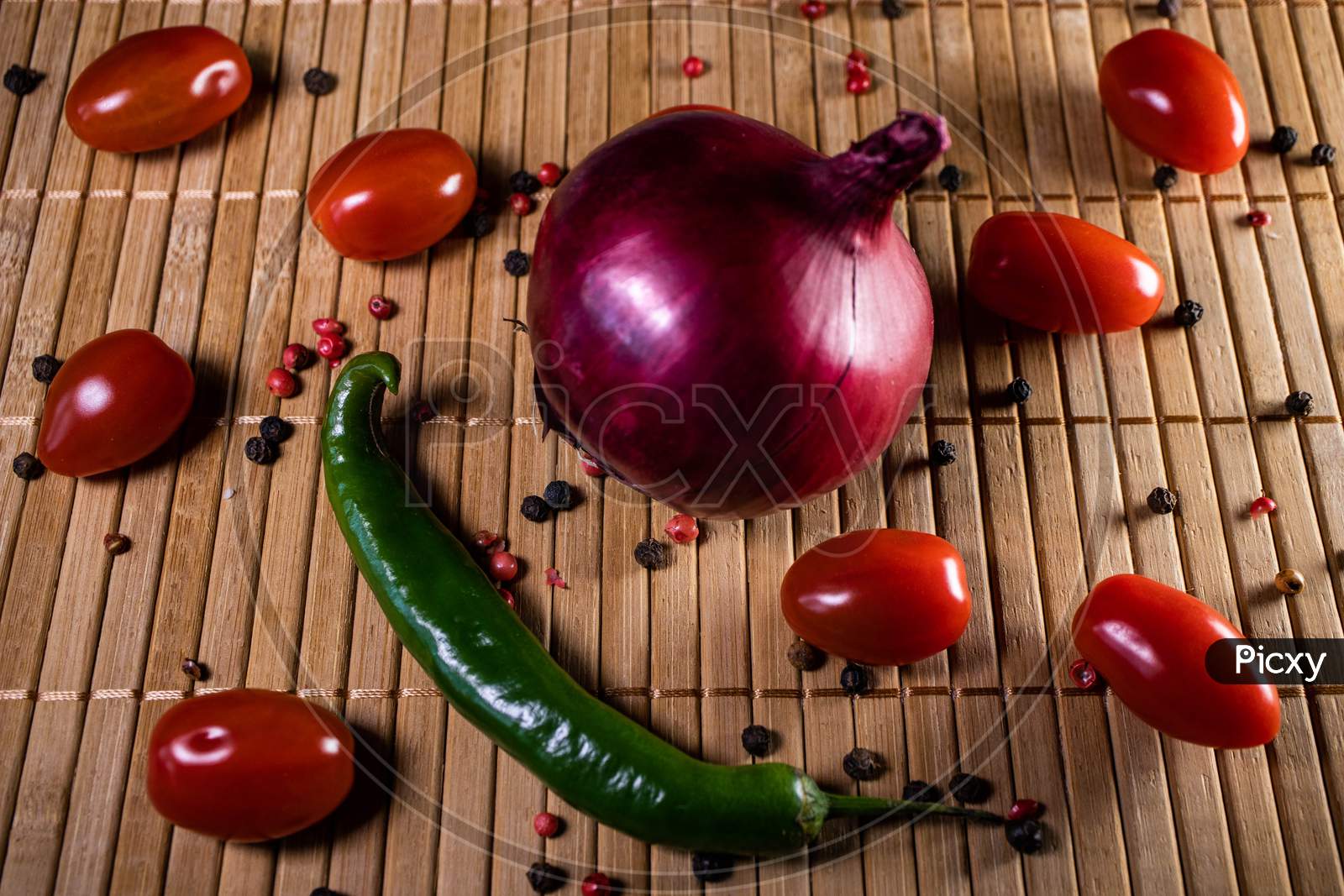 Chilli Pepper An Cherry Tomatoes Background.
