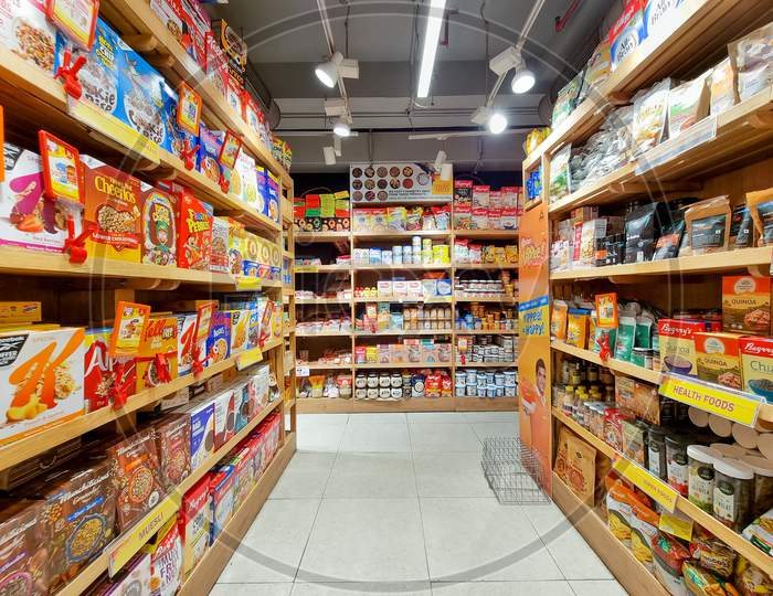 Fmcg Products On Shelf With Colorful Packaging Showing Easy To Make And Eat Products Health Foods And More Made By Companies Like Unilever, Nestle, Kellogs And More