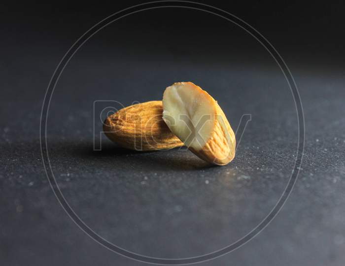Close Up Of Almond On Dark Background