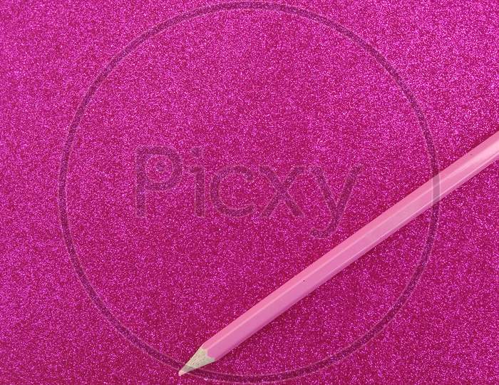 Glitter textured pink shaded background wallpaper.