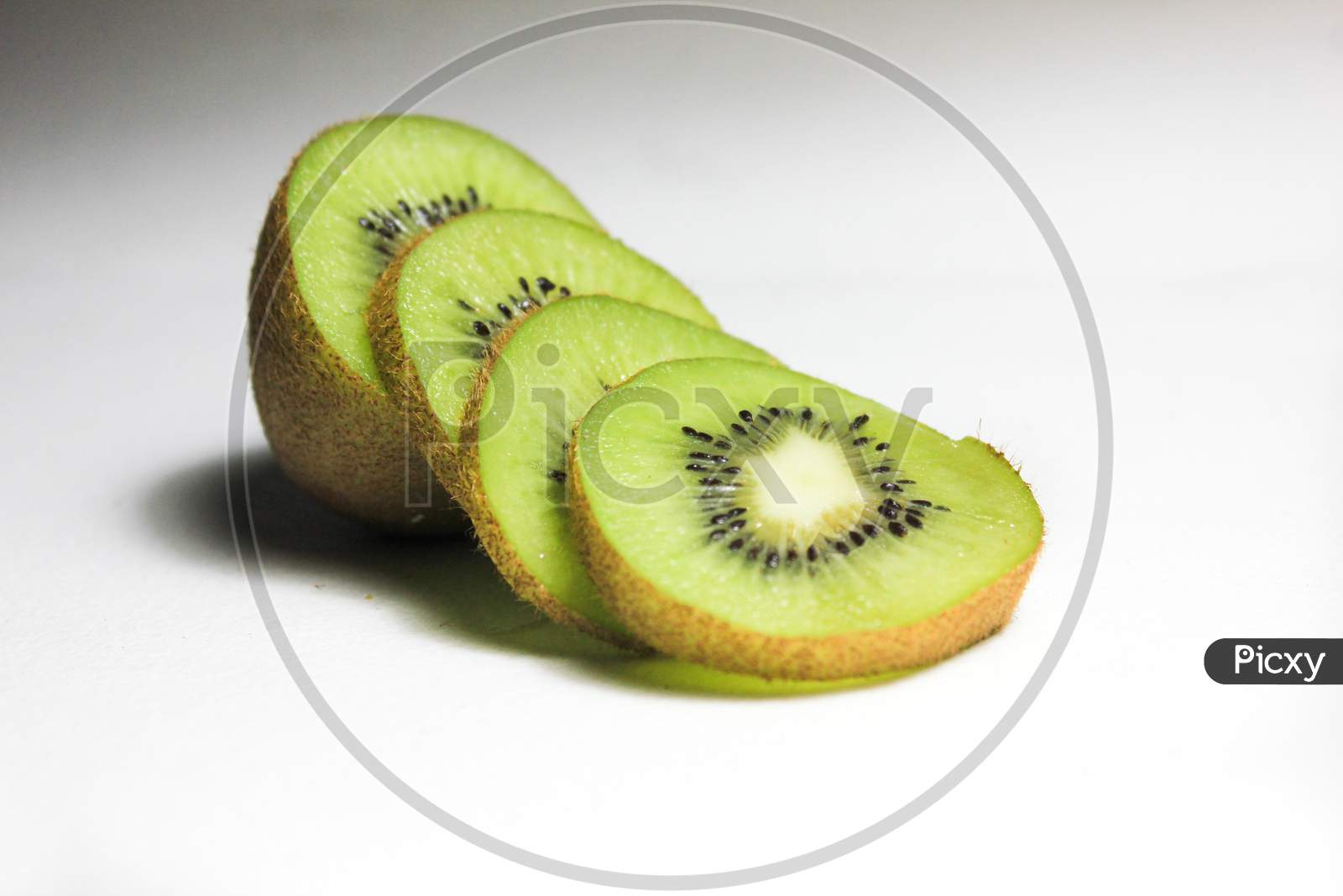 Cut Kiwi Fruit On A Table