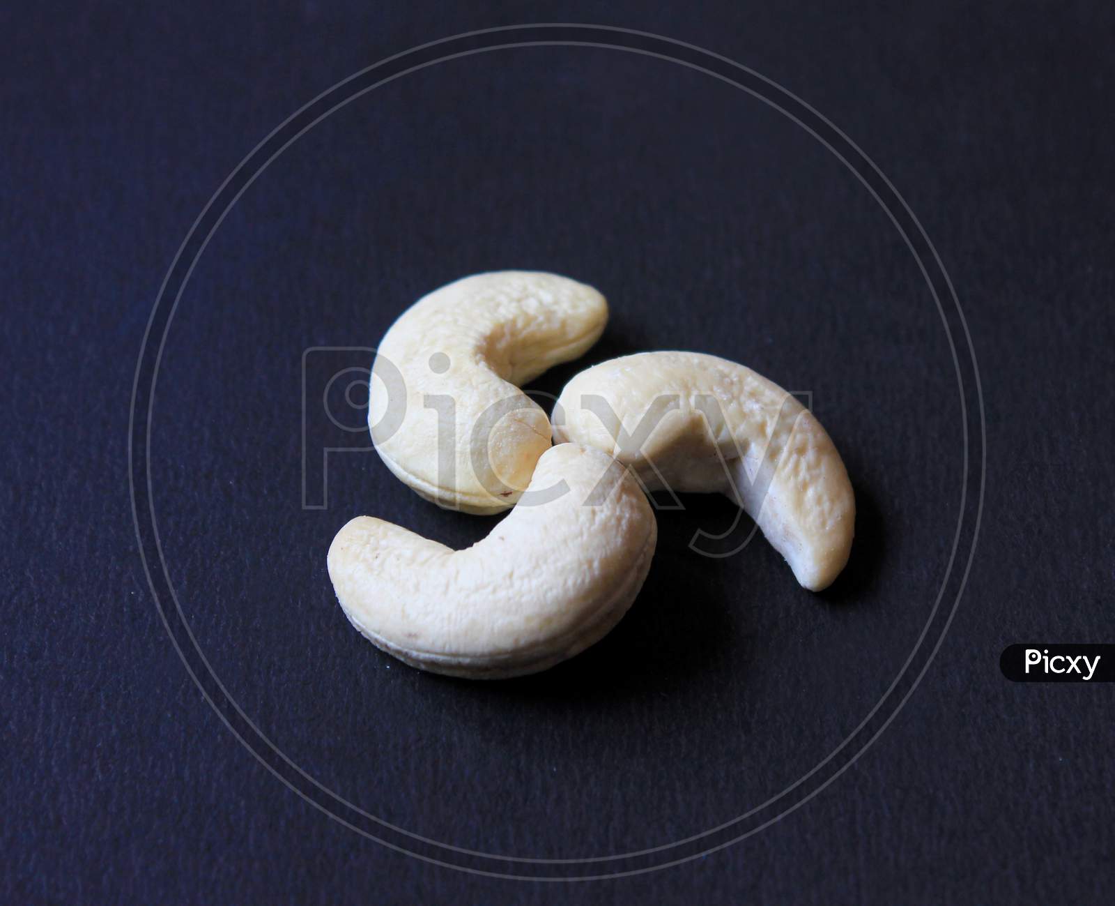 Cashew Nuts Isolated In A Dark Background