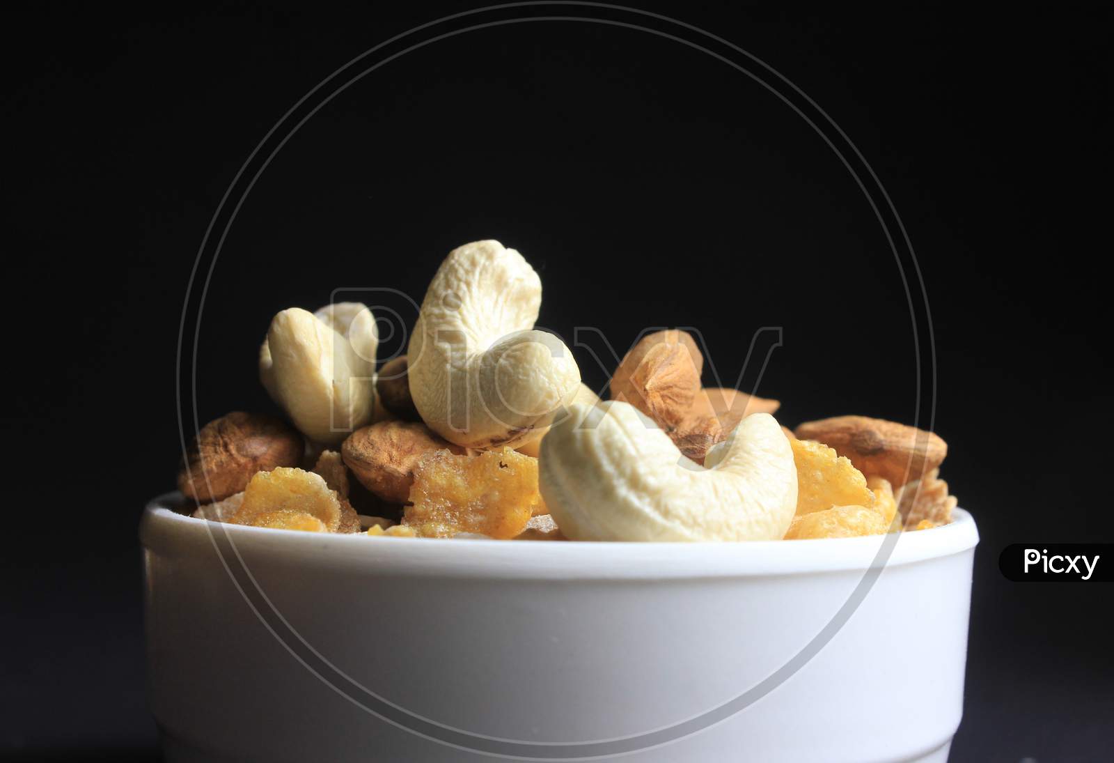 Close Up Of Cashew Nut And Almonds In A Cup