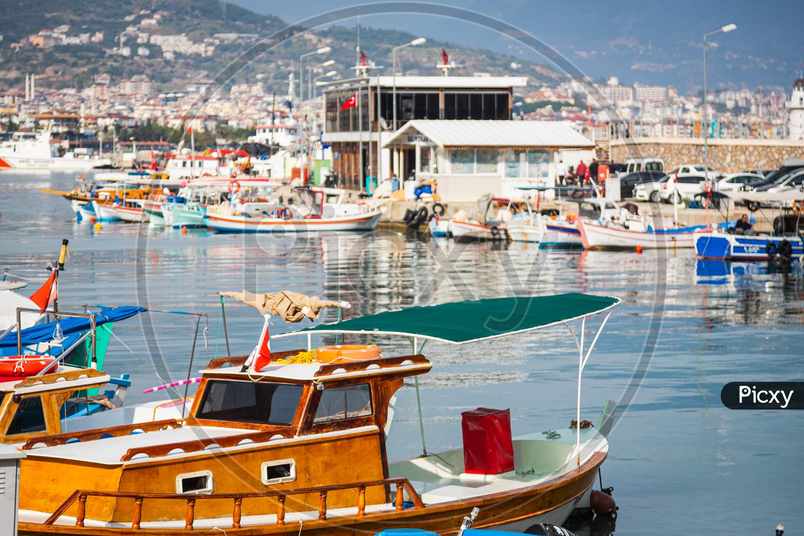 Image of Wooden Boards Of Boats, Painted White And Brown, Moored To The