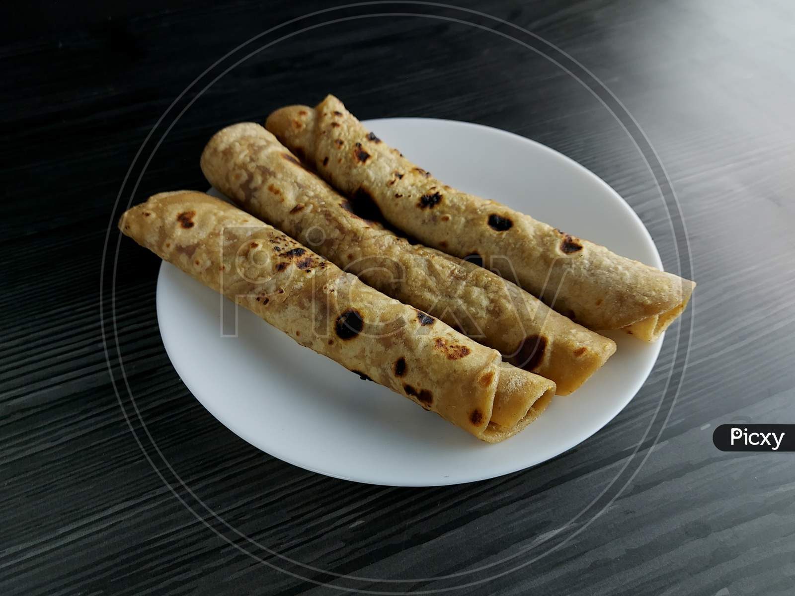 Rolled Roti on plate