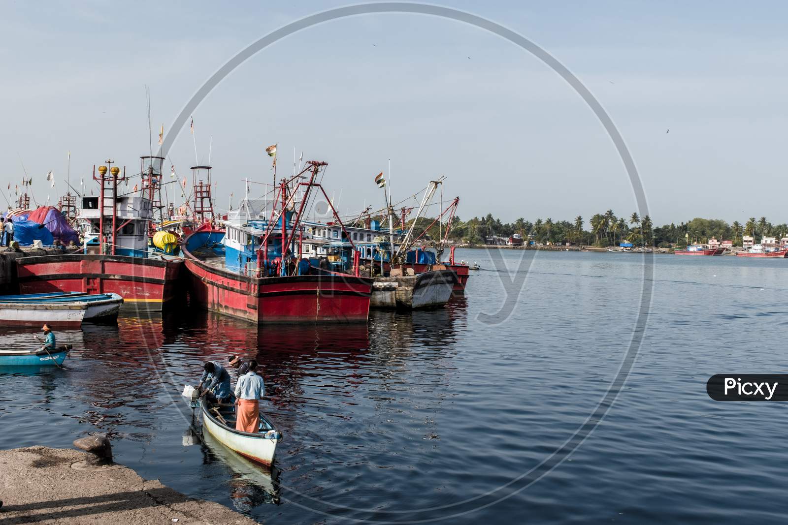 "Mangalore, Karnataka, India - April 2Nd 2021 : Landscape Shot Of Mangalore Fishing Ships Resting On Their Yard