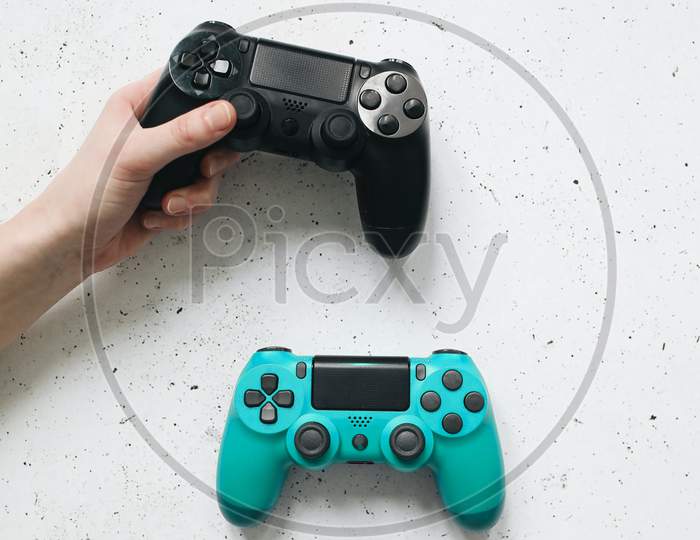 black and blue gaming console