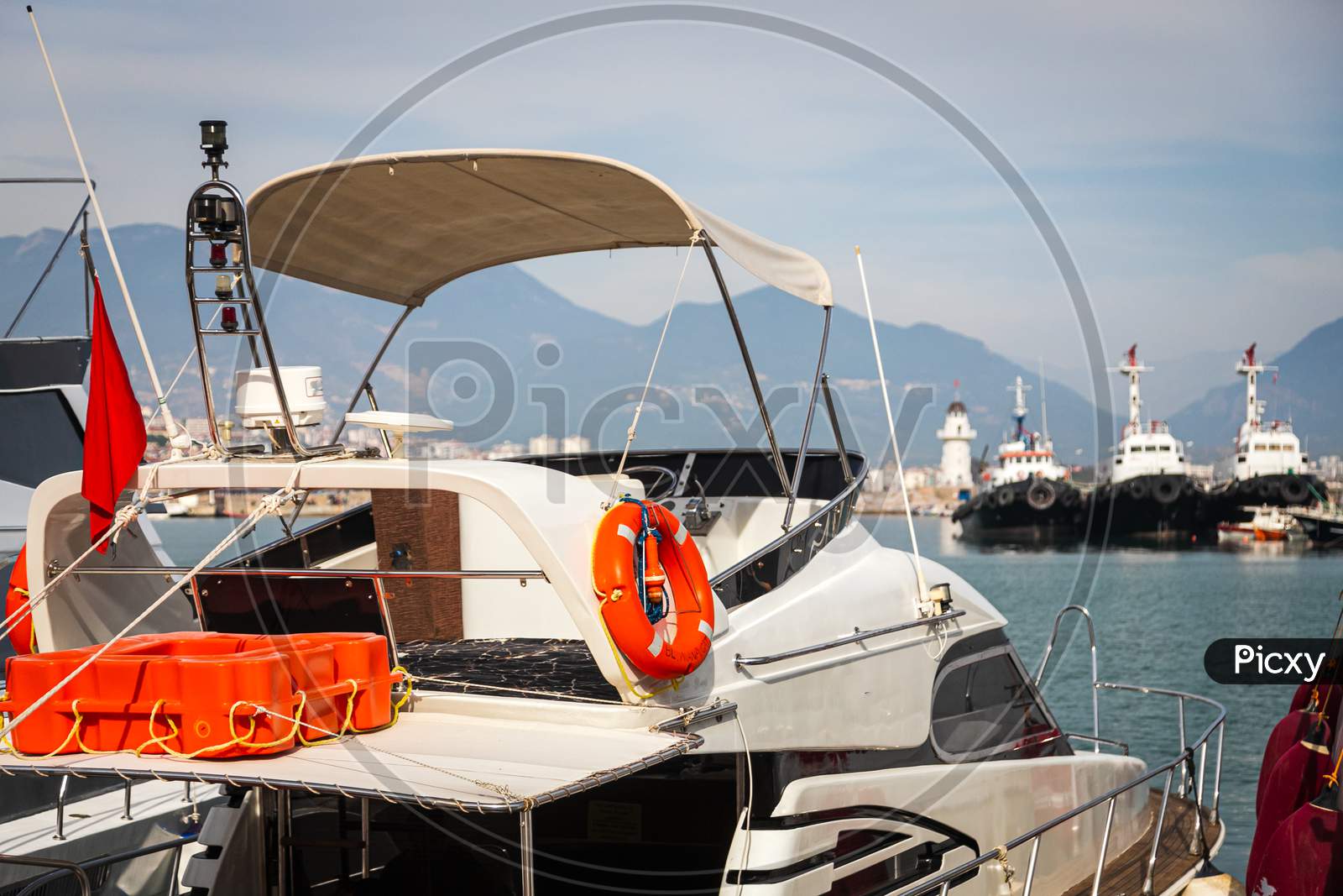 Image of Wooden Side Of The Boat, Painted White And Brown, With A ...