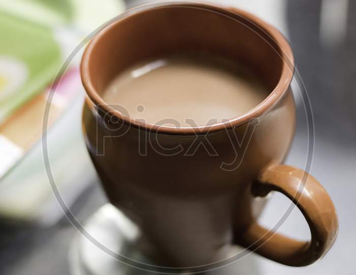 Kullhad chai. Tea in a clay pot or cup. A cup of tea in Indian traditional style.