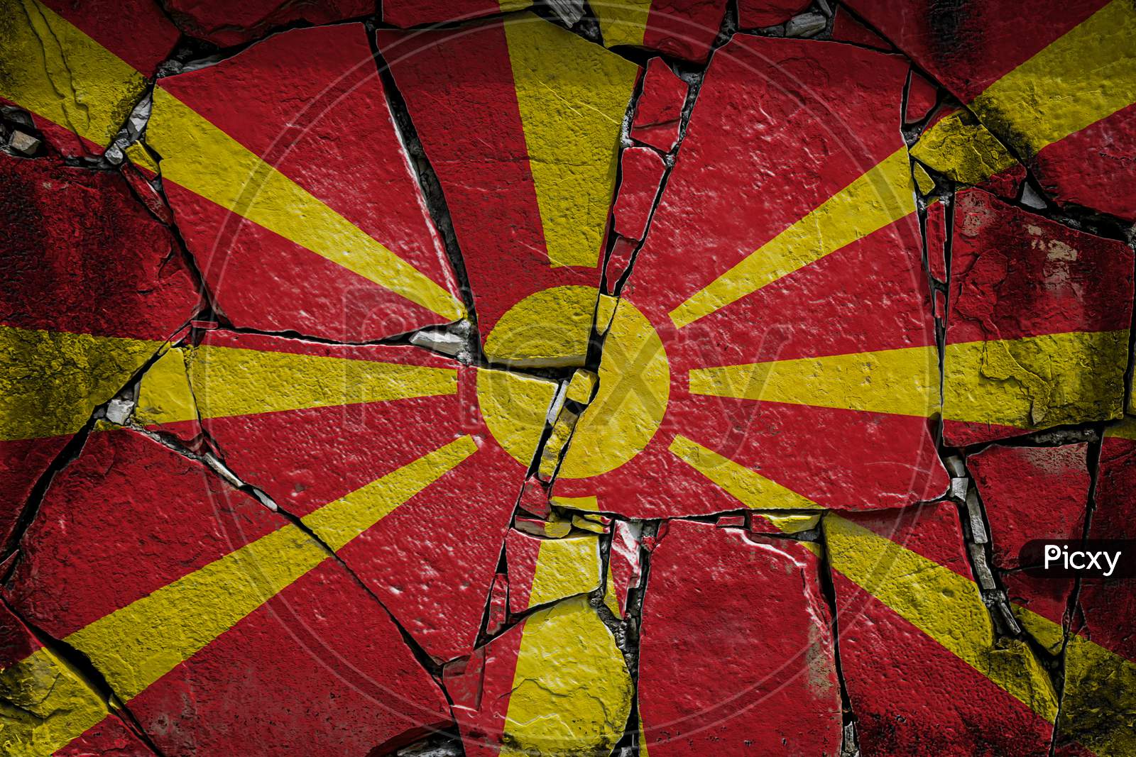 National Flag Of Macedonia Depicting In Paint Colors On An Old Stone Wall. Flag  Banner On Broken  Wall Background.